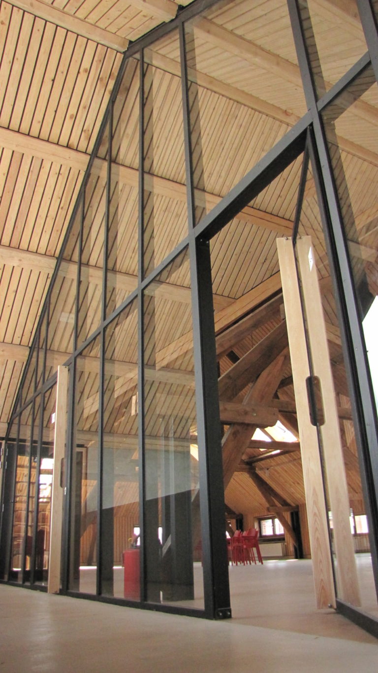 Mur rideau intérieur en profil acier sur structure - avec portes